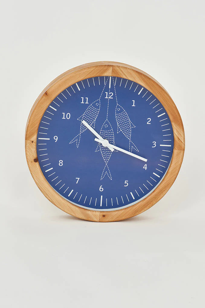 Horloge murale avec motif de poissons