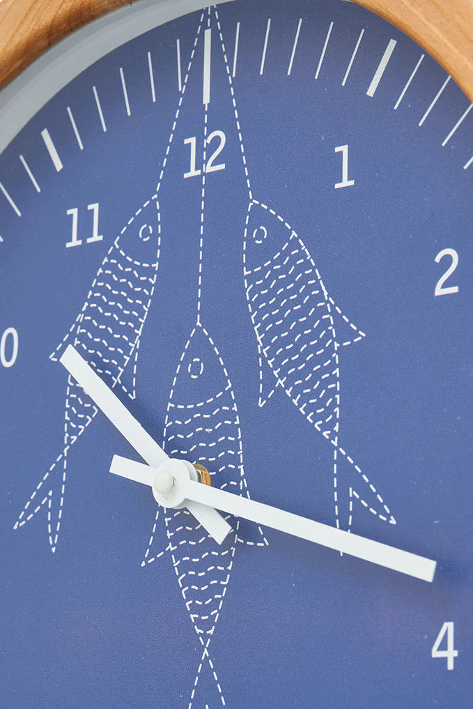 Horloge murale avec motif de poissons