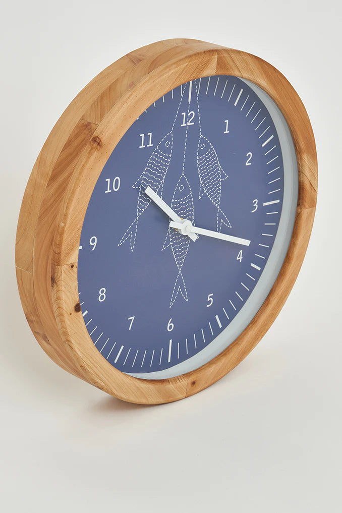 Horloge murale avec motif de poissons