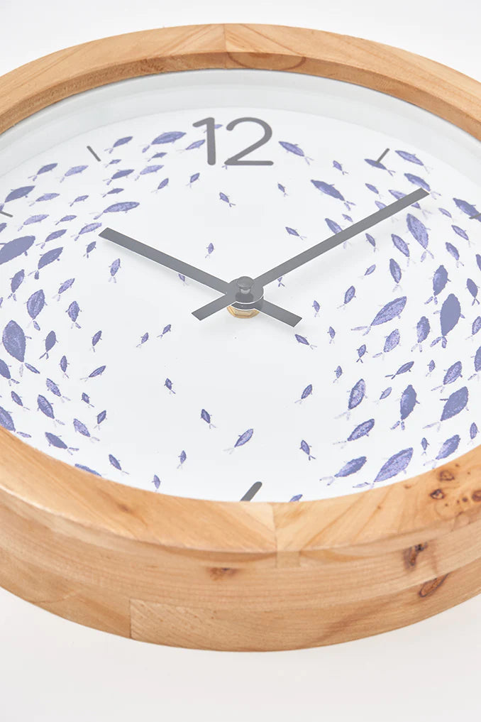 Horloge murale avec motif de poissons
