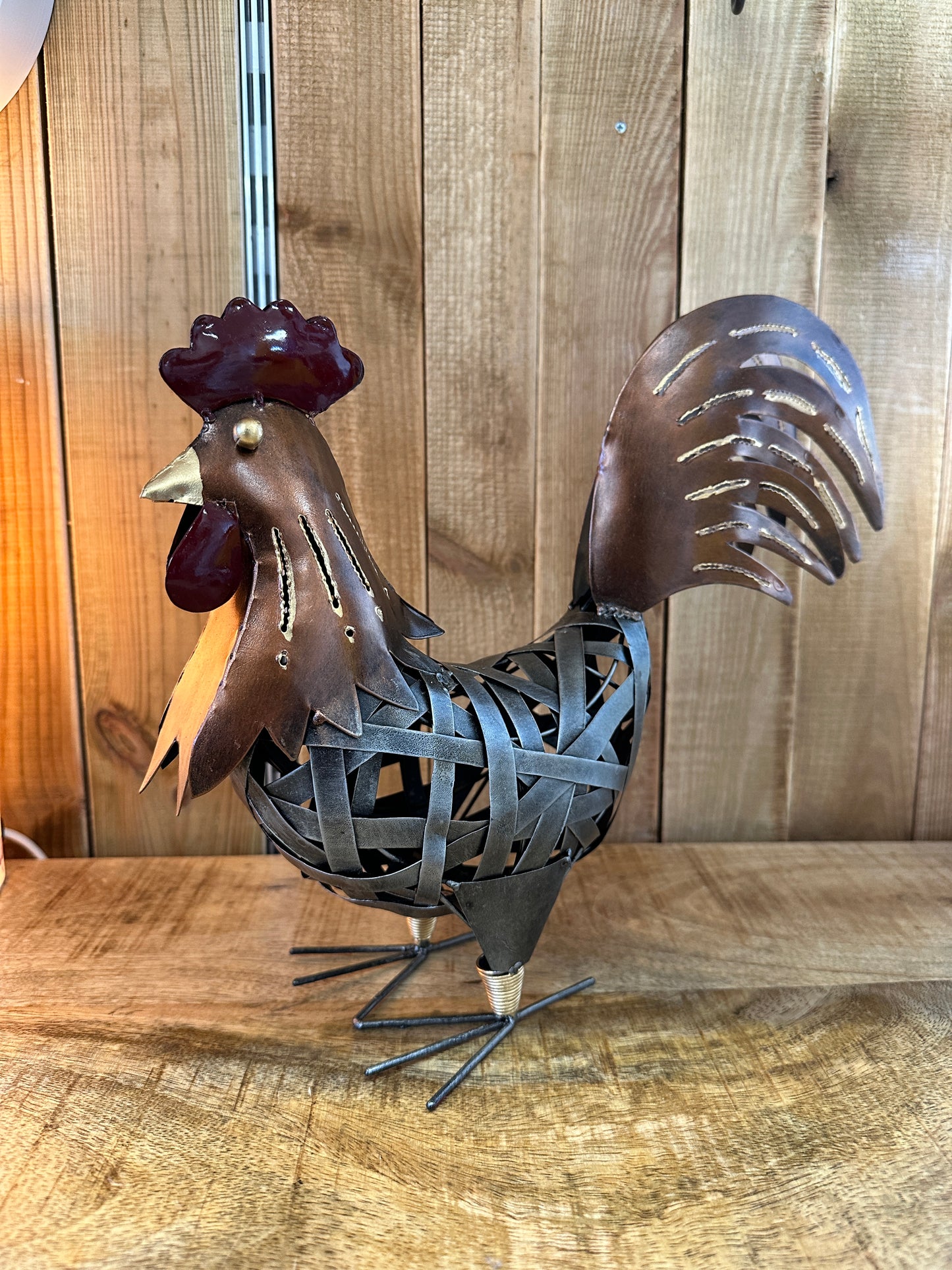 Coq ajouré cuivré