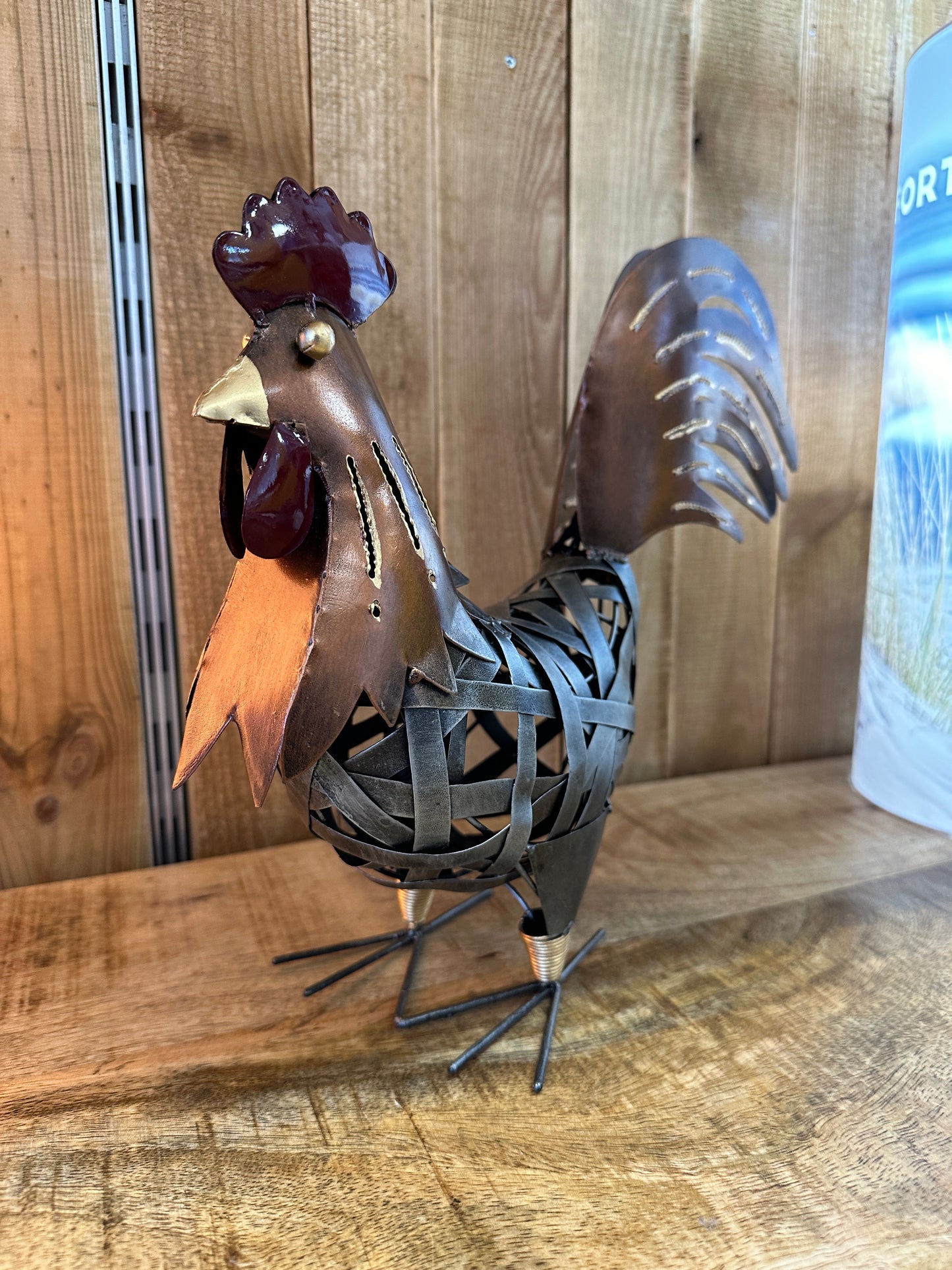 Coq ajouré cuivré