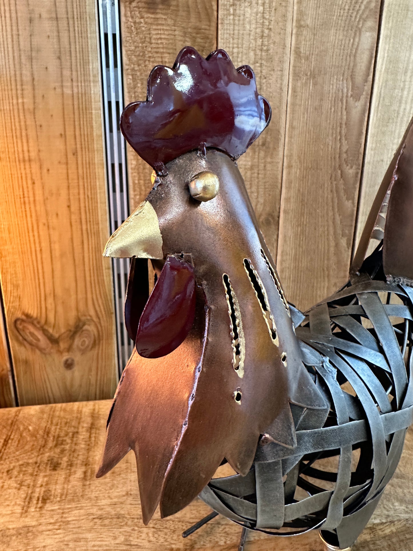 Coq ajouré cuivré