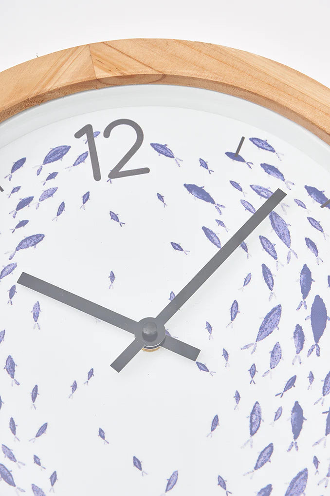 Horloge murale avec motif de poissons